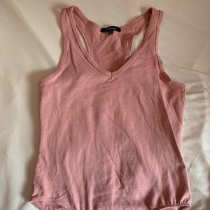 Fashion Nova Blush colored body suit